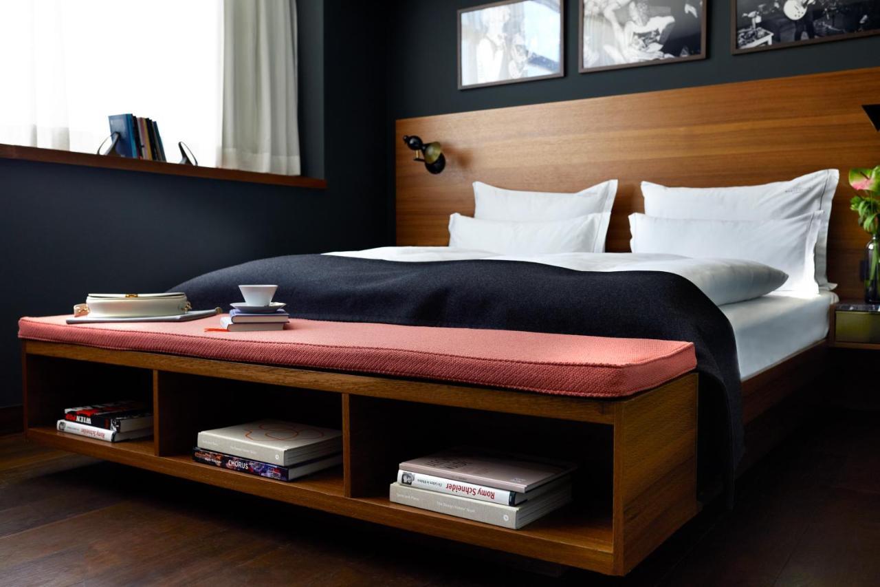The Guesthouse Вена Экстерьер фото A bed with a storage platform